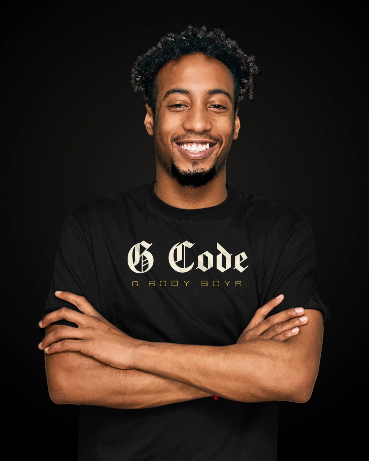 Smiling 412DonkLife ambassador, arms crossed, wearing the G Code tee